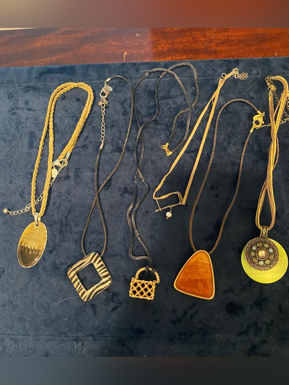 5-Chicos necklace’s and 1-Swarovski (black with gold and crystal basket)